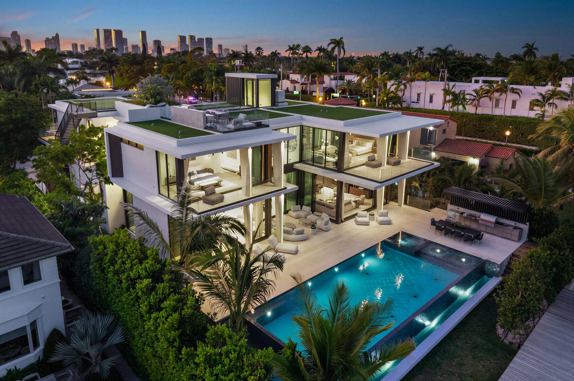 Modern waterfront estate at dusk